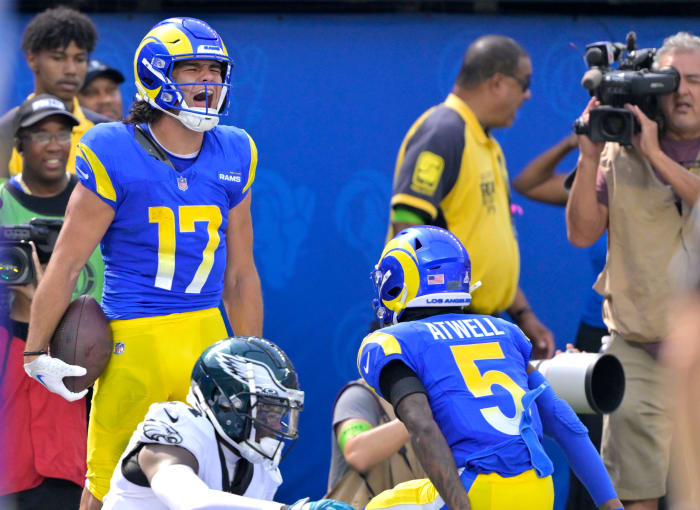 Nacua celebrates a touchdown with receiver Tutu Atwell.